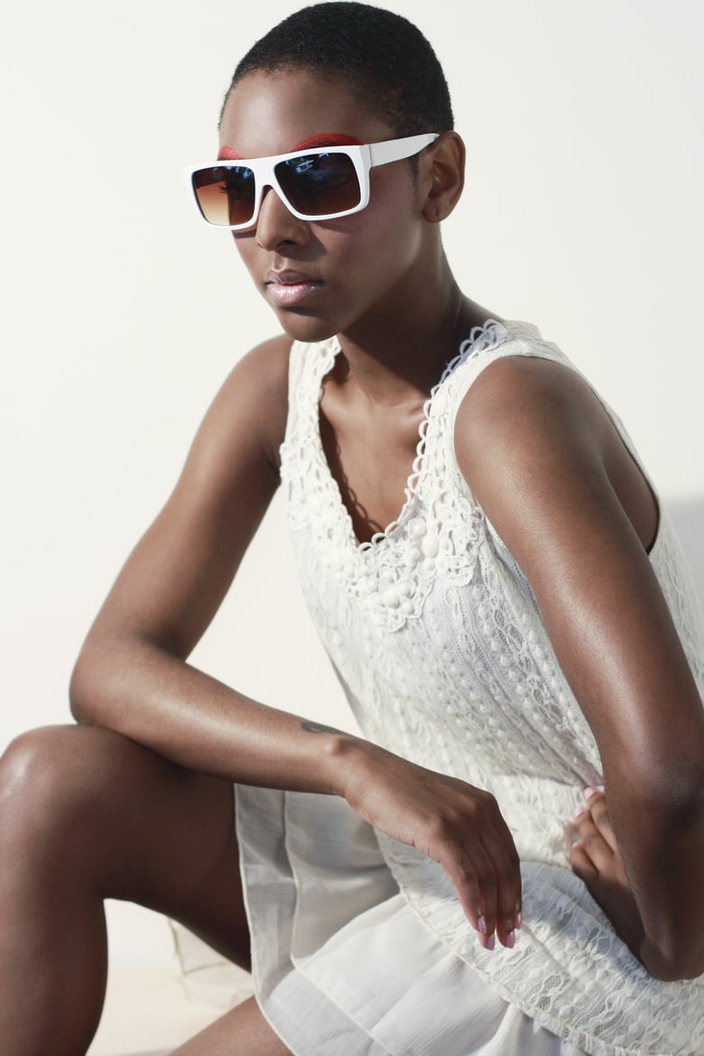 Model in White Dress and Eyewear